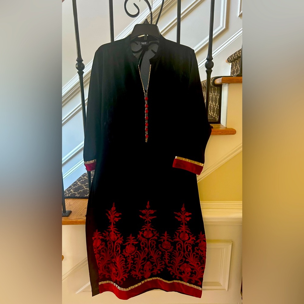 Black kurta with red work.